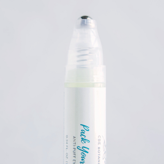 CBE Botanicals Pack Your Bags Anti-Puff Eye Gel showing rollerball tip